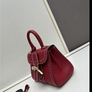 Red delvaux bag